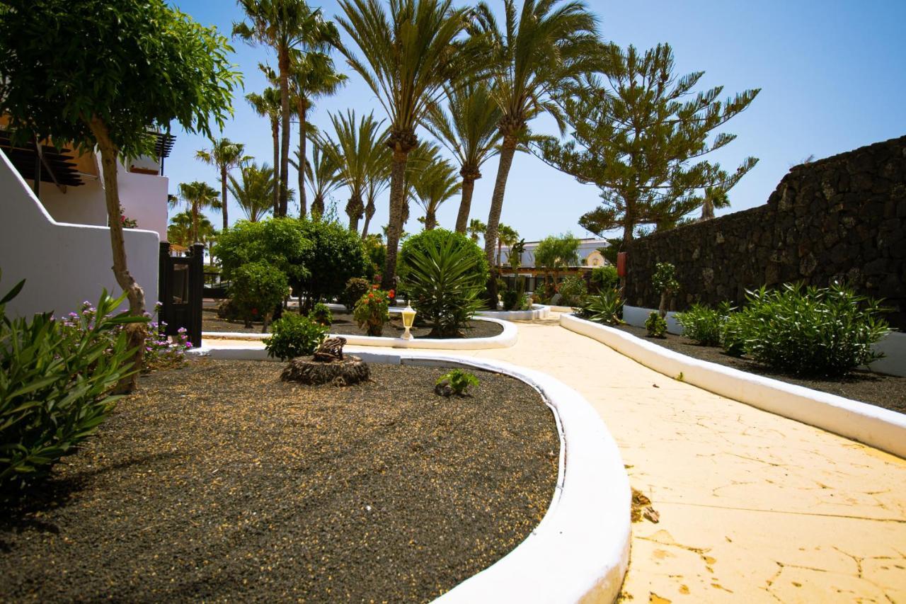 Апартаменты Oasis San Antonio Пуэрто дель Кармен Экстерьер фото